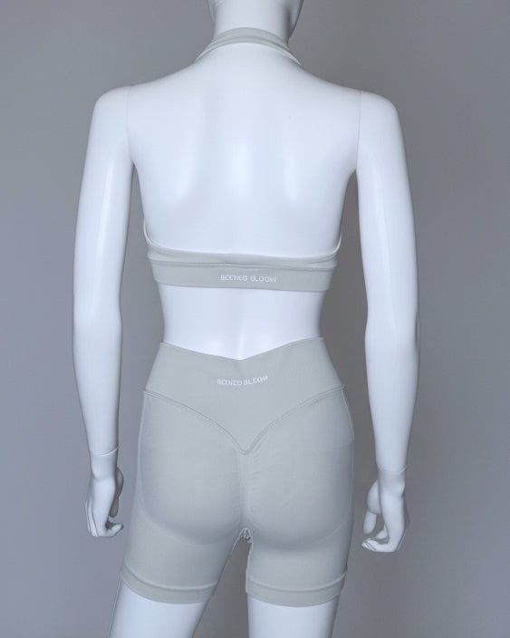 Sculpted Halter Shorts Set ivory front view – high-waist gym shorts and halter sports bra for women
