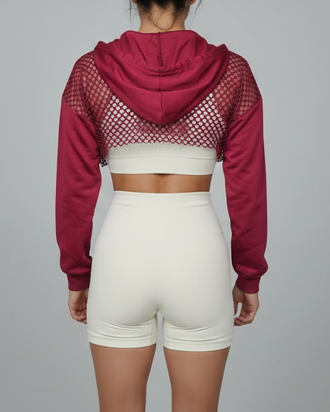 woman wearing a red hoodie with a mesh back