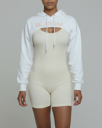 woman wearing a white 'bloom' cropped hoodie